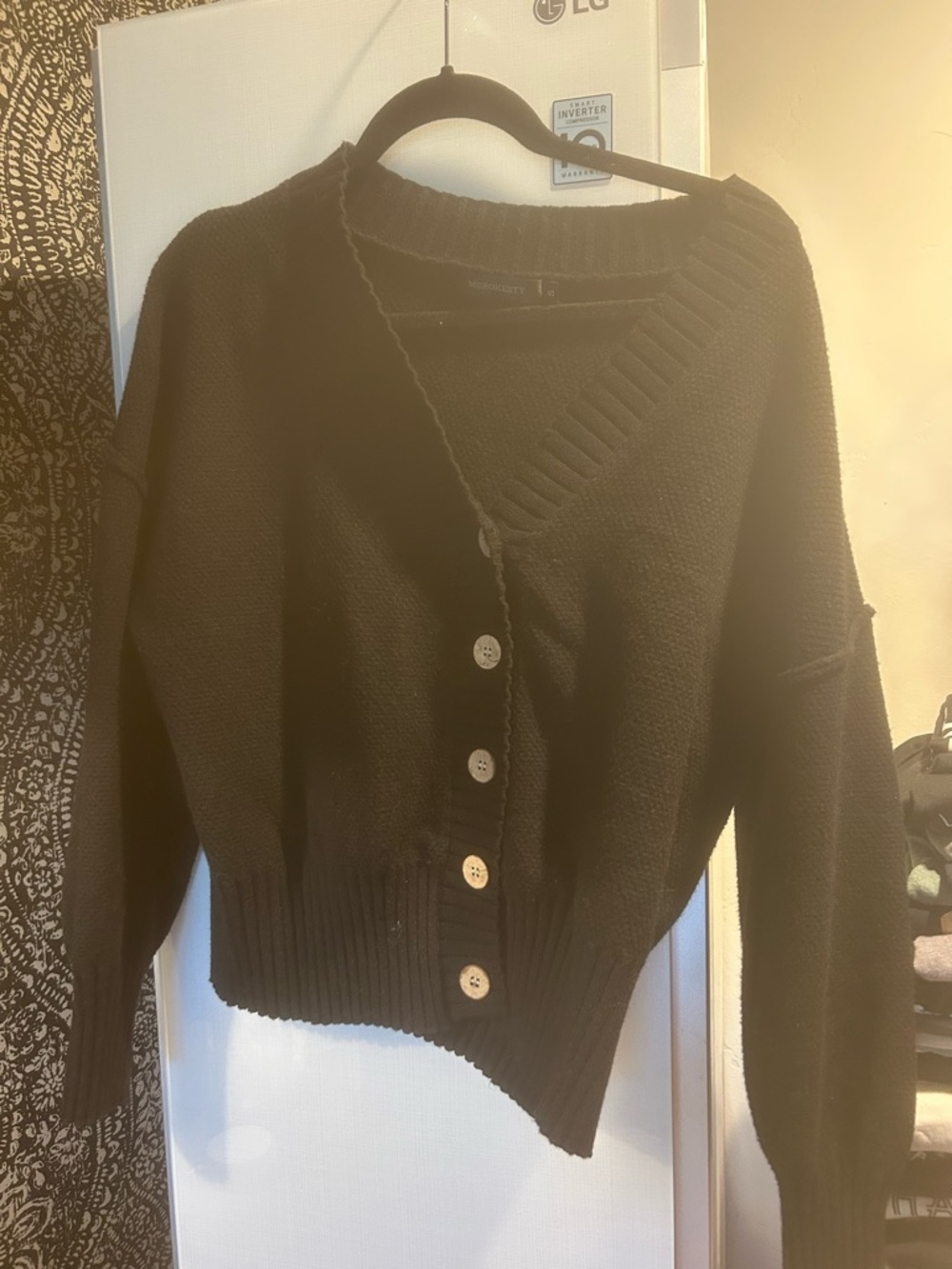 Black Asymmetric Button-Front Women's Sweater Cardigan and matching pants.